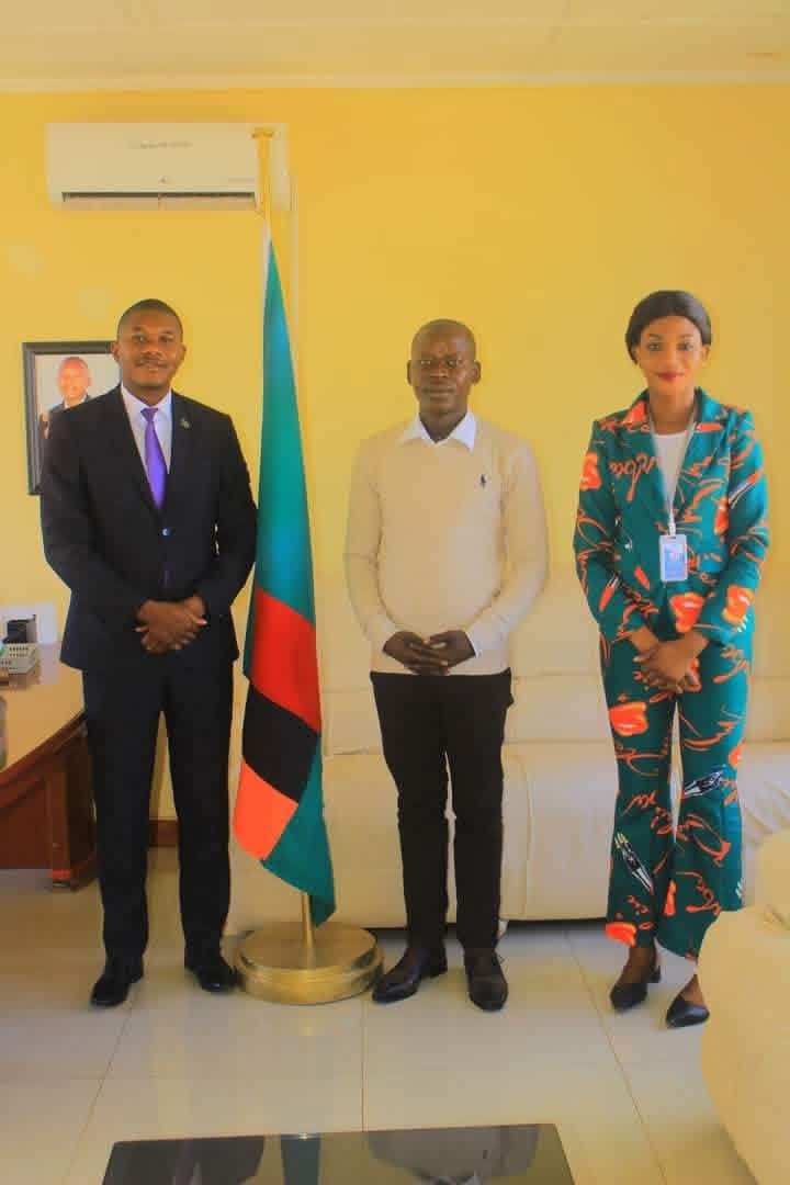 PIC Zambia official meeting with Zambia national flag