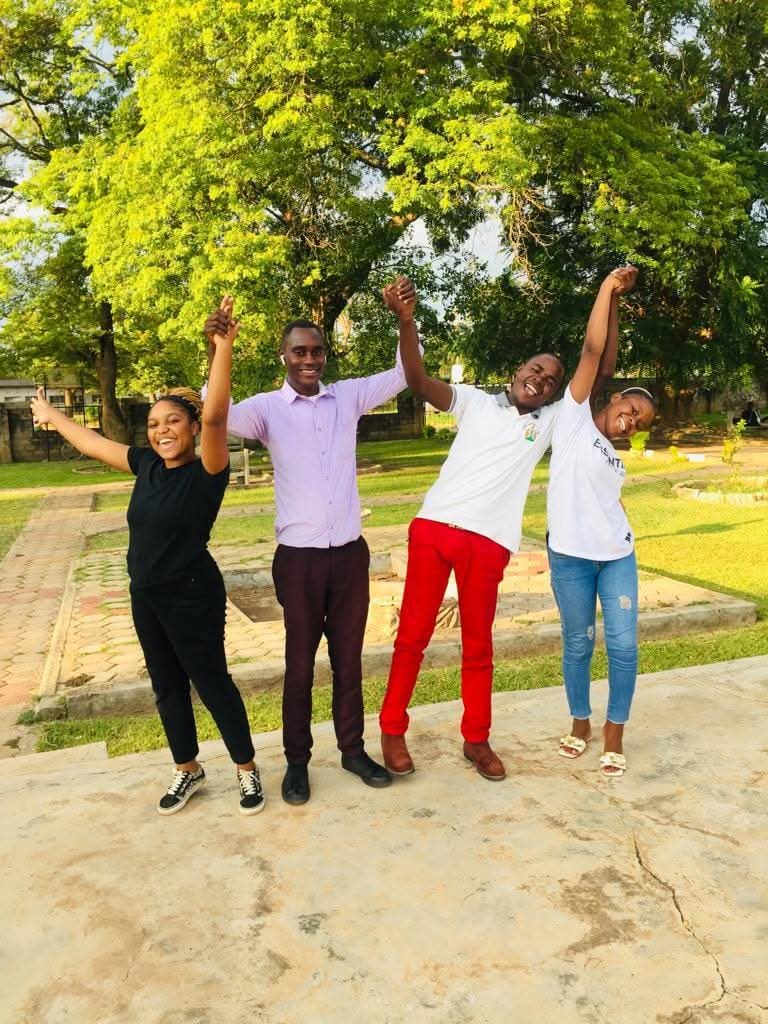 PIC Zambia youth volunteers celebrating democratic participation